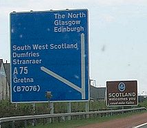 Picture of the signs on the motorway, welcoming to Scotland